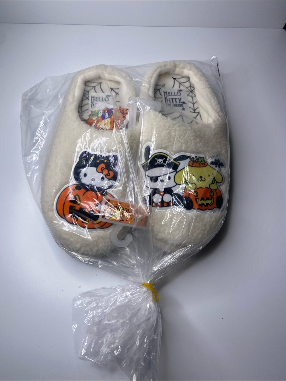 Hello Kitty Cream Plush Adult Halloween Slip-On One-Piece Slippers
